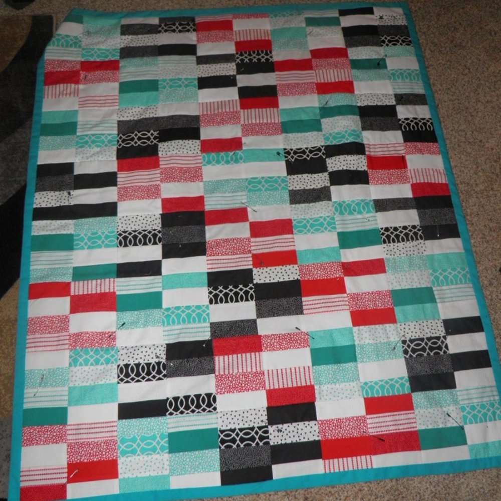 TURQUOISE BLACK & WHITE QUILT